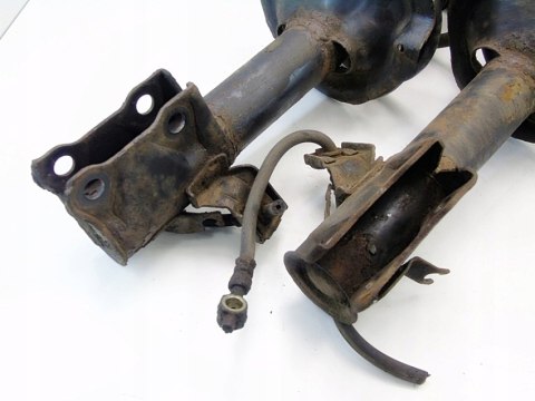 Amortyzatory mcpherson przód komplet Nissan Almera Tino 2.2 DI DCI 2002