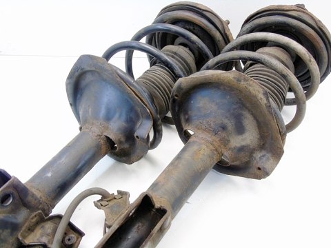 Amortyzatory mcpherson przód komplet Nissan Almera Tino 2.2 DI DCI 2002