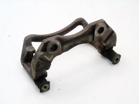 Jarzmo zacisku hamulcowego lewy przód Nissan Almera Tino 2002 2.2 DI DCI