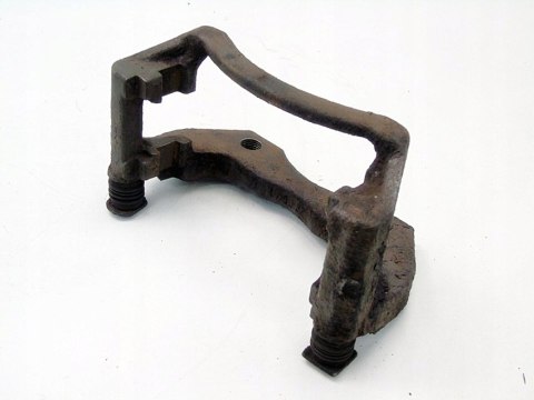 Jarzmo zacisku hamulcowego lewy przód Nissan Almera Tino 2002 2.2 DI DCI