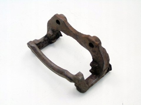 Jarzmo zacisku hamulcowego prawy przód Nissan Almera Tino 2002 2.2 DI DCI