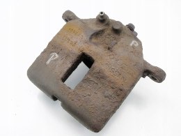 Zacisk hamulcowy przwy przód Nissan Almera Tino 2002 2.2 DI DCI